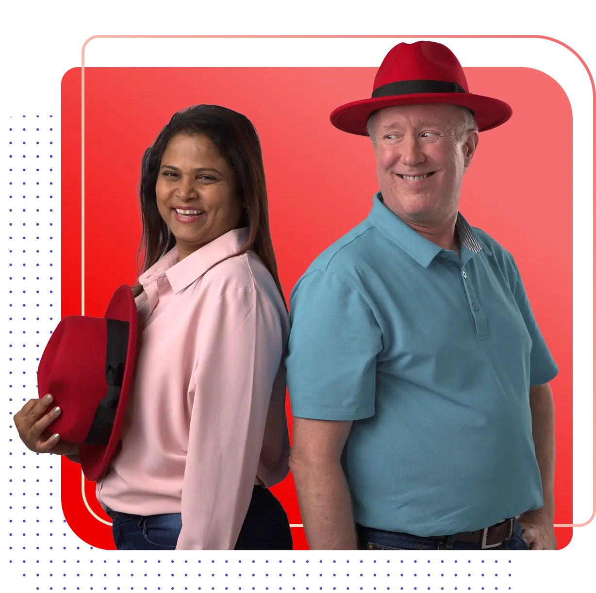 Smiling colleagues wearing red fedoras