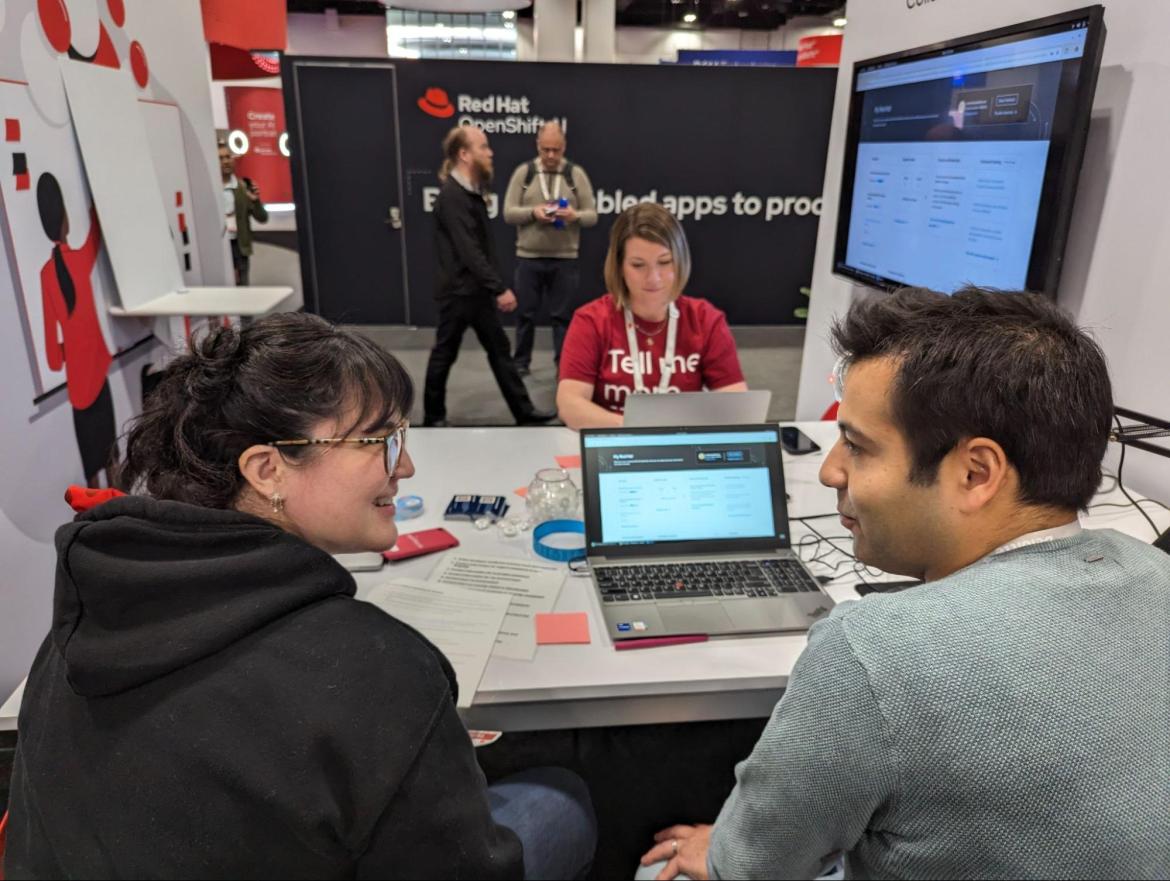 Photo of 1:1 interview in the Experience Zone booth at Red Hat Summit 2024