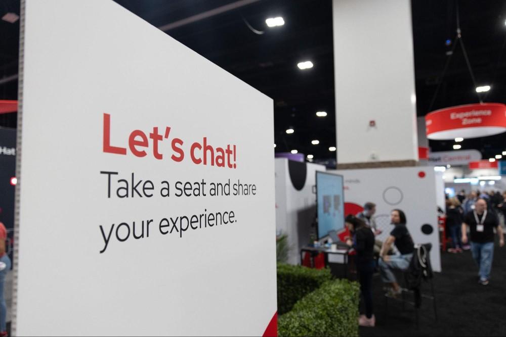 Photo of the Experience Zone booth at Red Hat Summit 2024